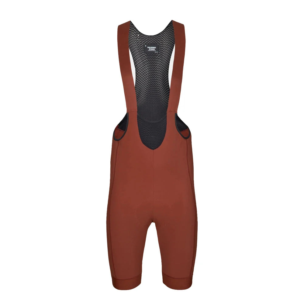 PAS NORMAL STUDIOS Deep Winter Bib Shorts - Mahogany PAS NORMAL STUDIOS Deep Winter Bib Shorts - Mahogany